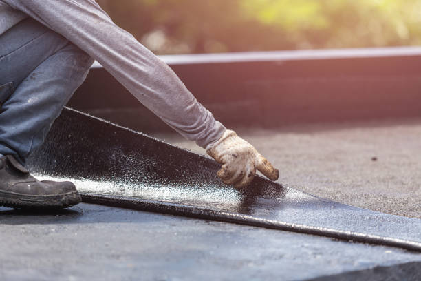 Professional Basement Waterproofing technician working in Warsaw, KY